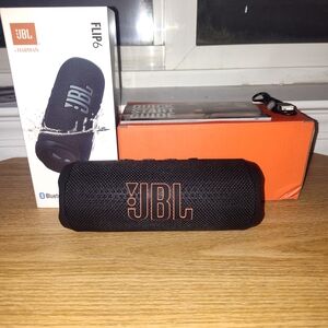 JBL Flip 6 Portable Bluetooth Speaker - Black and Orange